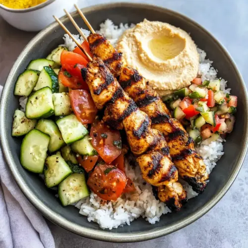 Mediterranean Rice Bowl with Grilled Chicken Tawook Skewers